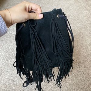 Suede bucket bag with tassels